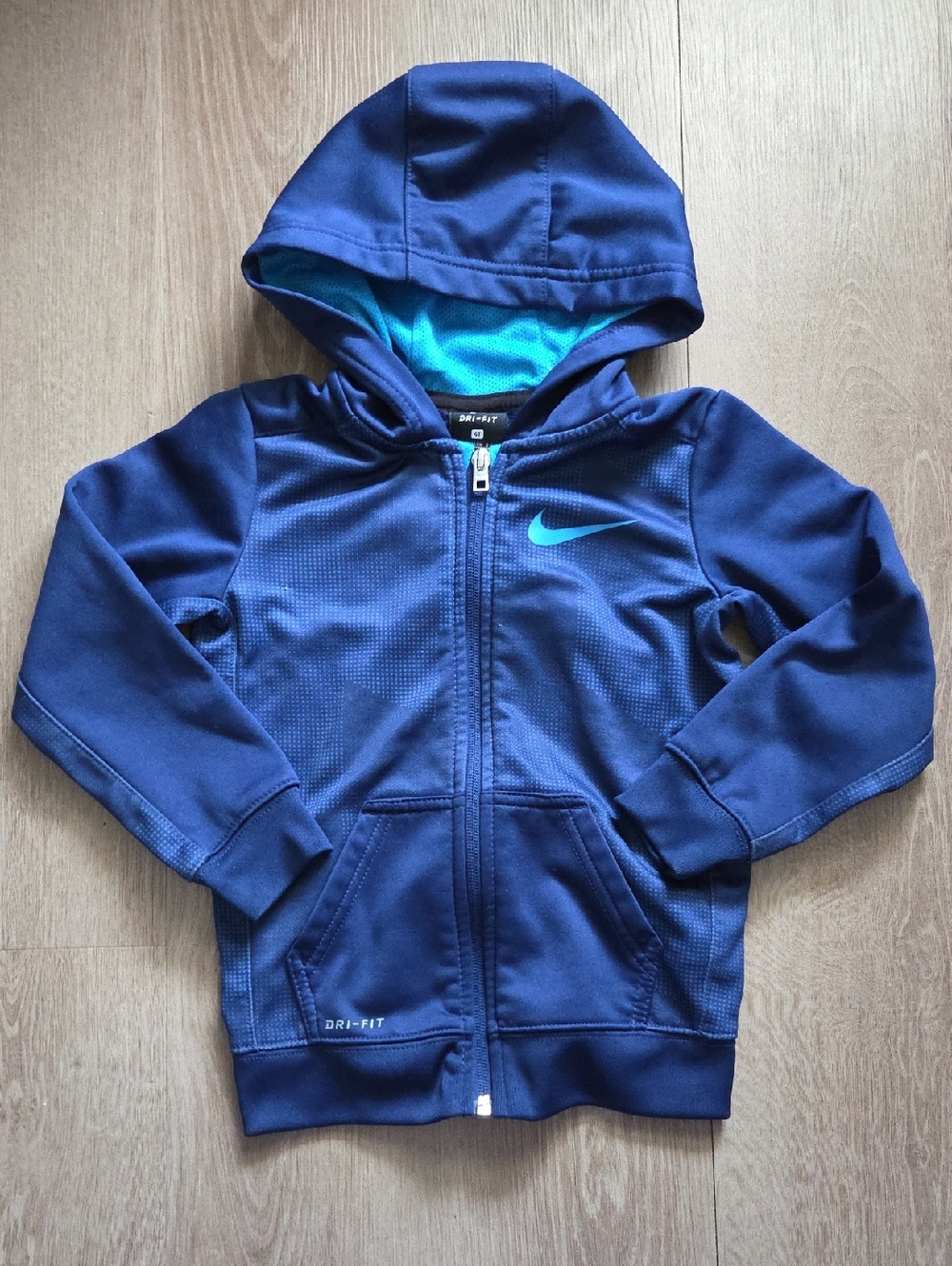 Nike Youth Navy Blue Zip-Up Hoodie with Teal Swoosh